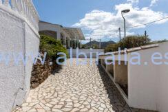 Mediterranean home with solar panels for sale
